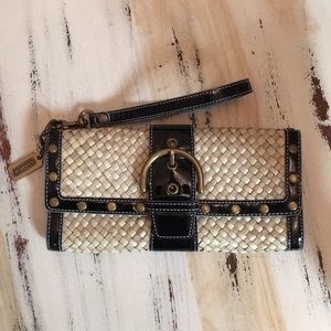 Straw clutch with black patten leather